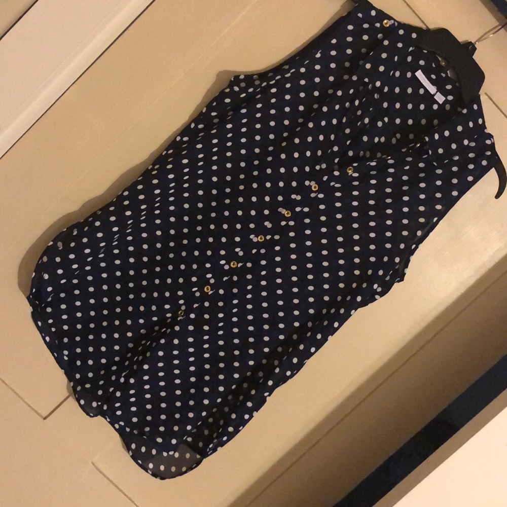 Sleeveless navy blue/white blouse